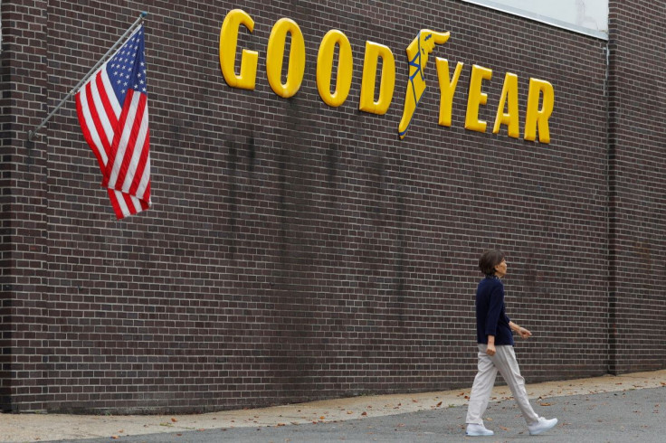 A pedestrian walks past a Goodyear Tire facility in Somerville, Massachusetts, U.S., July 25, 2017.   