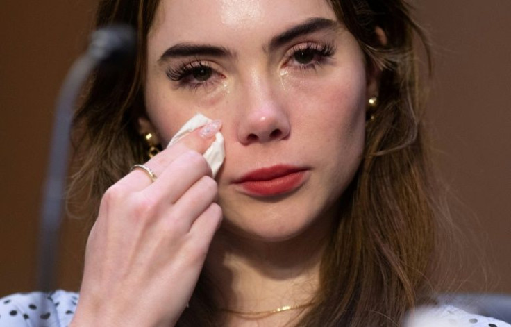 US Olympian McKayla Maroney wipes away tears during testimony before the Senate Judiciary Committee