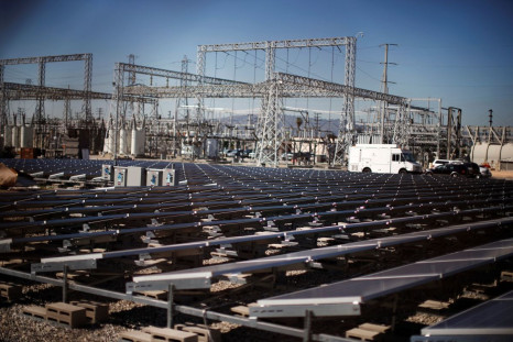 Solar panels are seen next to a Southern California Edison electricity station in Carson, California March 4, 2015. 