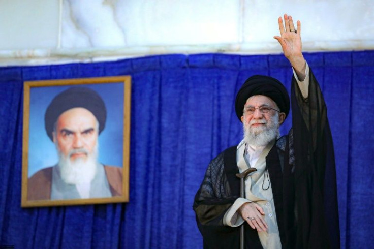 Iran's supreme leader Ayatollah Ali Khamenei at a ceremony on June 4, the death anniversary of his predecessor Ayatollah Ruhollah Khomeini, whose portrait appears behind him