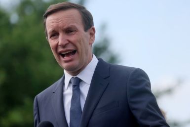 U.S. Sen. Chris Murphy (D-CT) speaks at an event opening a temporary memorial honoring 45,000 lives lost due to gun violence in 2020 on the National Mall near the Washington Monument in Washington, U.S., June 7, 2022. 