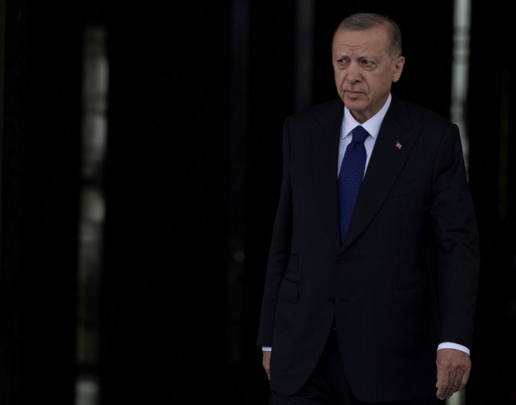 Turkish President Tayyip Erdogan arrives for a welcome ceremony at the Presidential Palace in Ankara, Turkey, June 8, 2022.