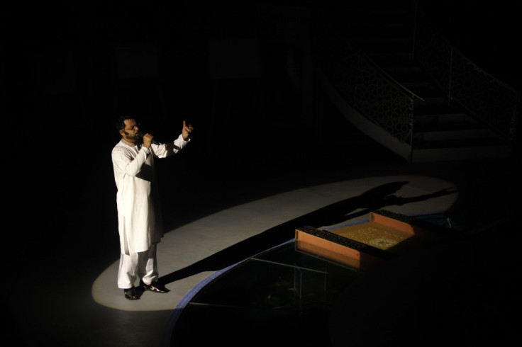 Aamir Liaquat Hussain, host of the Geo TV channel programme "Amaan Ramazan", recites religious rhyme during a live show in Karachi July 26, 2013. In a ruthless quest for ratings, Pakistani television is screening what many describe as its most controversi