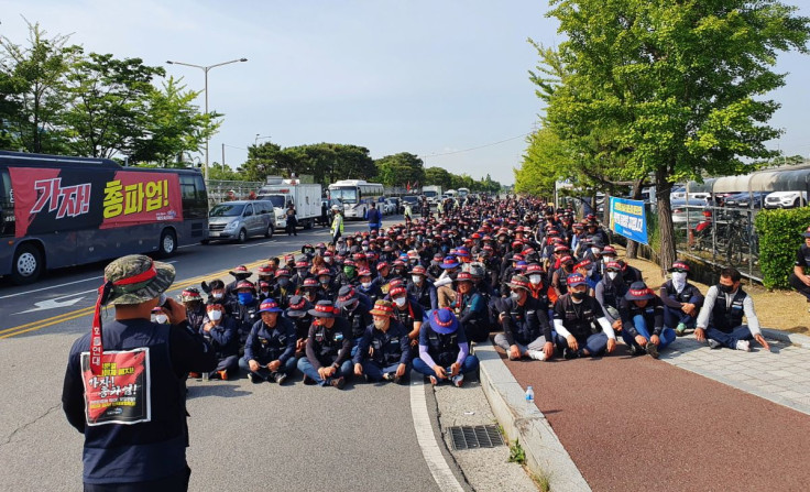 Members of the Cargo Truckers Solidarity union attend a protest in front of Hyundai Motor's factory in Ulsan, South Korea, June 10, 2022.  