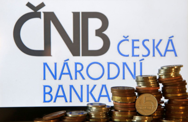 Czech Crown coins are seen in front of a displayed logo of Czech central bank (CNB) in this picture illustration taken April 1, 2017.
