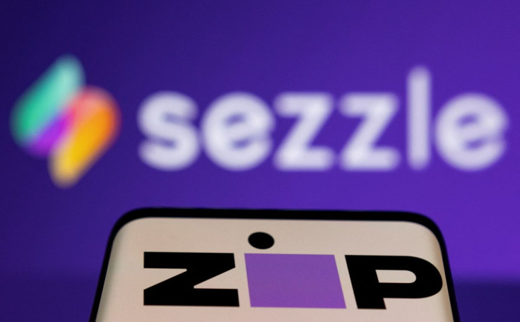 Zip logo is seen on a smartphone in front of displayed Sezzle logo in this illustration taken January 25, 2022.