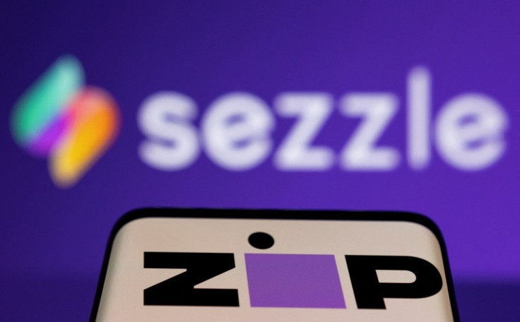 Zip logo is seen on a smartphone in front of displayed Sezzle logo in this illustration taken January 25, 2022. 