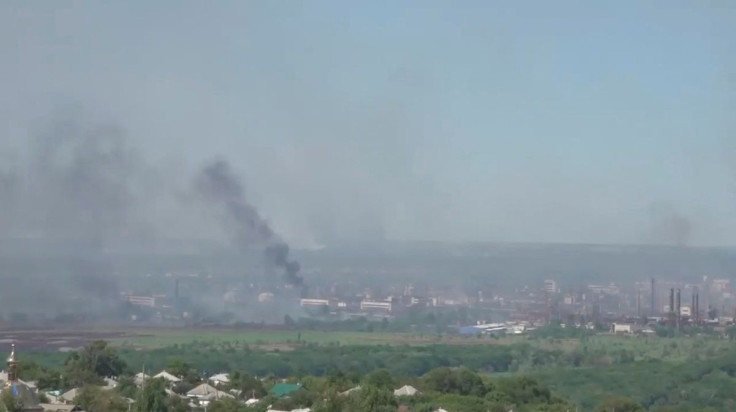 Black smoke billows over Sievierodonetsk as Russia's invasion on Ukraine continues, Luhansk Region, Ukraine, in this still image obtained from a handout video released on June 9, 2022. Luhansk Region Police/Handout via REUTERS