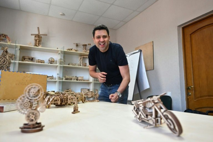 Work at the Ugears wooden toy factoy but scars from Russian invasion are still visible