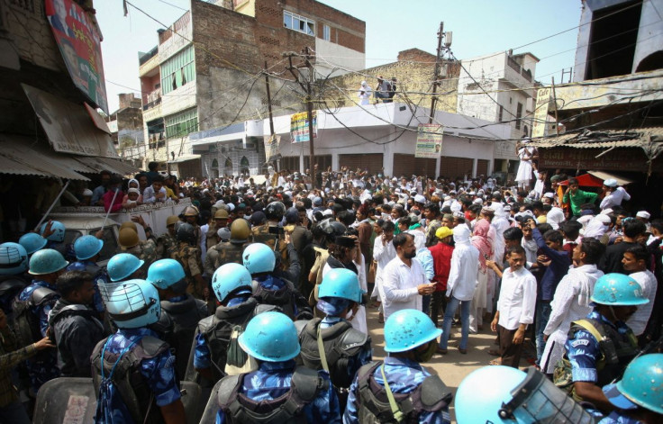 Protestors clash with police during a protest demanding the arrest of Bharatiya Janata Party (BJP) member Nupur Sharma for her comments on Prophet Mohammed, in Prayagraj, India, June 10, 2022.