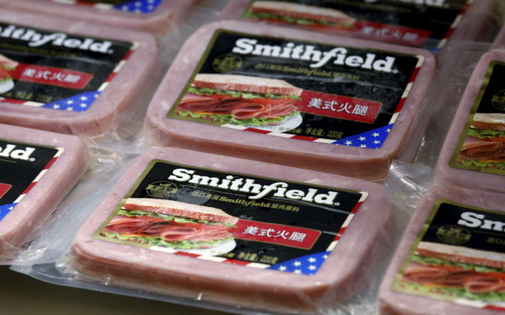 Products of Smithfield, acquired by WH Group, the largest pork company in the world, are displayed at a news conference on the company's annual results in Hong Kong, China March 29, 2016.