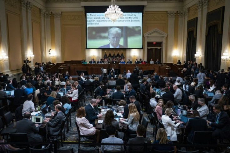 A tweet from former president Donald Trump is shown on a screen during the House select committee hearing into the January 6, 2021 insurrection