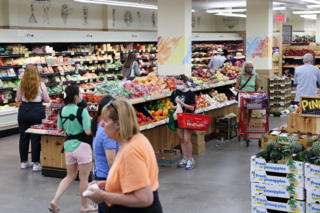 People shop in a supermarket as inflation affected consumer prices in Manhattan, New York City, U.S., June 10, 2022. 
