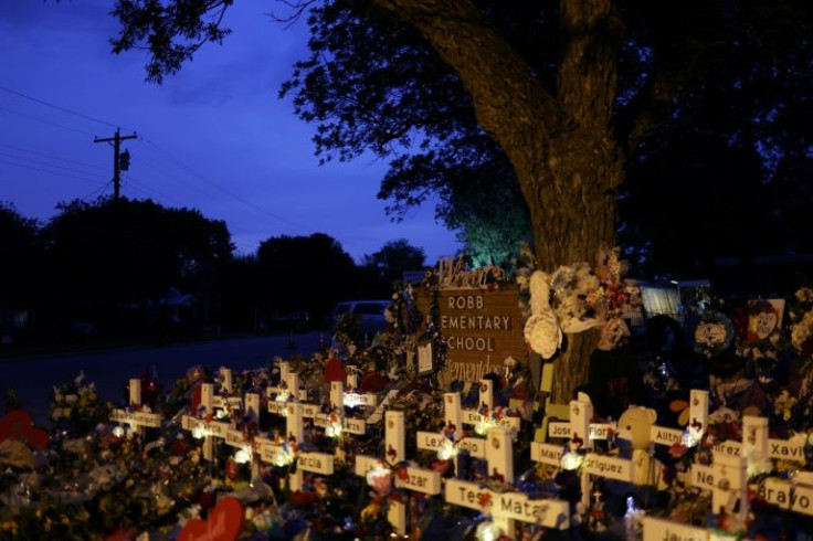 Wooden crosses at a memorial dedicated to the victims of the mass shooting at Robb Elementary School in Uvalde, Texas