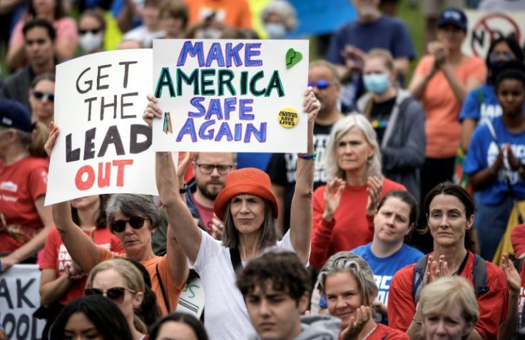 Demonstrators attend a protest calling for action on US gun violence in Washington, DC on June 11, 2022