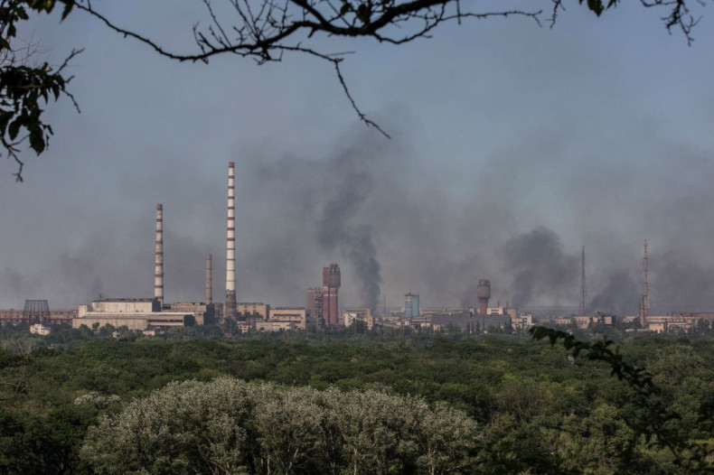 Smoke rises after a military strike on a compound of Sievierodonetsk's Azot Chemical Plant, amid Russia's attack on Ukraine, in the town of Lysychansk, Luhansk region, Ukraine June 10, 2022. Picture taken June 10, 2022. 