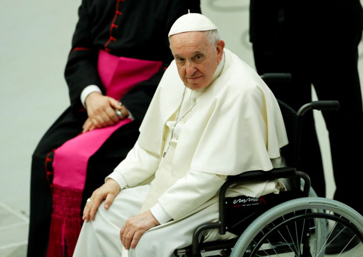 Pope Francis arrives for a meeting with soldiers of Italy's 'Granatieri di Sardegna' brigade at the Vatican, June 11, 2022. 