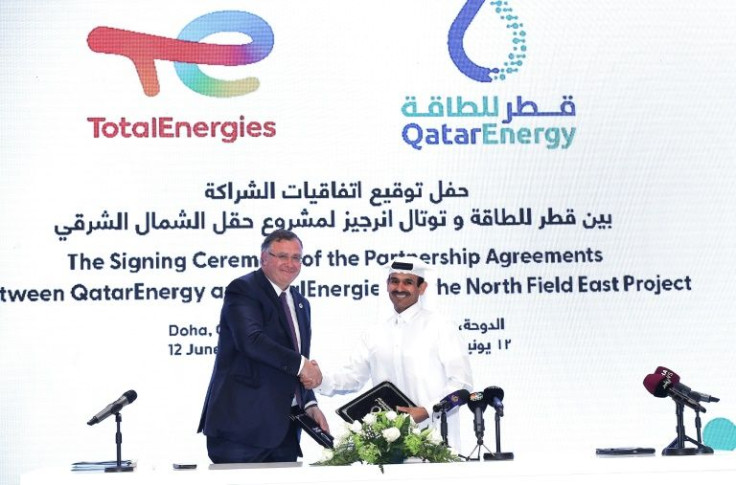 Qatar's  Energy Ministerand CEO of QatarEnergy Saad Sherida al-Kaabi (R) and French energy group TotalEnergies CEO Patrick Pouyanne attend a signing ceremony in Doha