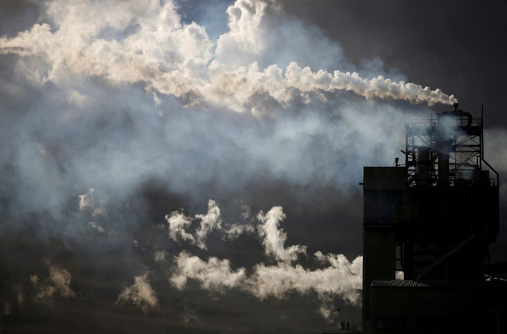 A view shows emissions from the chimneys of Yara France plant in Montoir-de-Bretagne near Saint-Nazaire, France, March 4, 2022. 