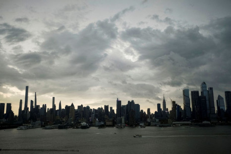 Rain clouds cover the skyline of Manhattan at the start of the Memorial Day weekend, as seen from Weehawken, New Jersey, U.S., May 27, 2022.  