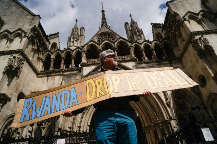Protesters gathered outside the Royal Courts of Justice in London on Monday
