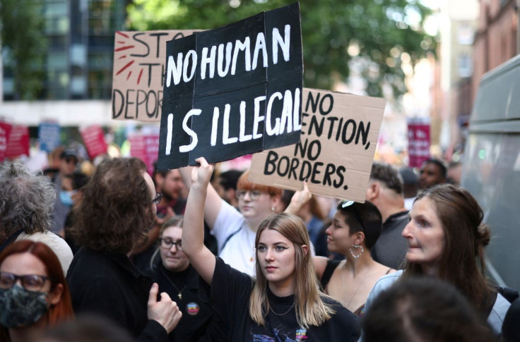 Protestors demonstrate outside the Home Office against the British Governments plans to deport asylum seekers to Rwanda, in London, Britain, June 13, 2022.