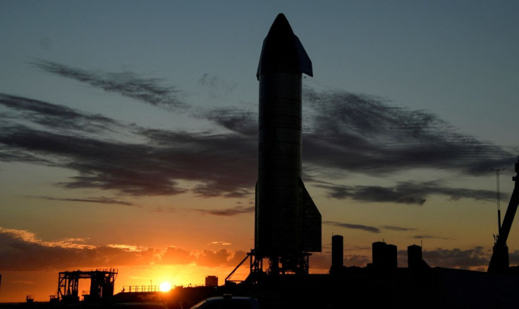 The sun sets as SpaceX prepares their super heavy-lift Starship SN8 rocket  for a test launch this week at the company's facilities in Boca Chica, Texas, U.S. December 1, 2020.  