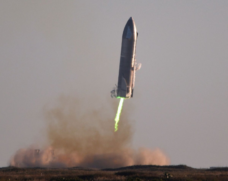 SpaceX's first super heavy-lift Starship SN8 rocket prepares to land after it launched from their facility on a test flight in Boca Chica, Texas U.S. December 9, 2020. 