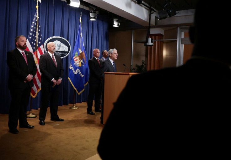 United States Attorney General Merrick Garland is joined by U.S. Attorney for the Northern District of Texas Chad Meacham and Jeff Boshek, Special Agent in Charge of the ATFâs Dallas Field Division, during a press conference announcing a significant fir