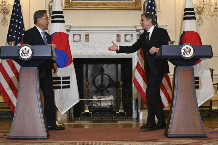 US Secretary of State Antony Blinken reaches to shake the hand of South Korean Foreign Minister Park Jin after a press conference in Washington