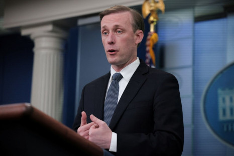 National Security Advisor Jake Sullivan answers questions while Press Secretary Karine Jean-Pierre looks on, during the daily media briefing at the White House in Washington, U.S., May 18,  2022. 