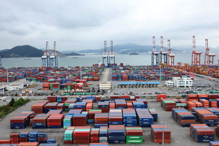 Shipping containers are stacked at Gwangyang port in Gwangyang, South Korea, June 14, 2022. Yonhap via REUTERS