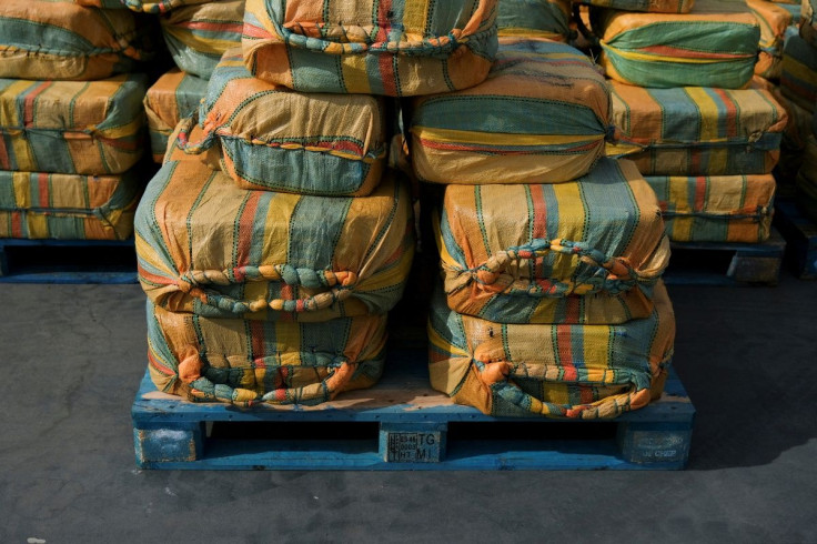Cloth sacks of cocaine are seen during a Portuguese and Spanish police news conference presenting the 5.2 tons of cocaine seized in the Atlantic Ocean, in Almada, Portugal, October 18, 2021.