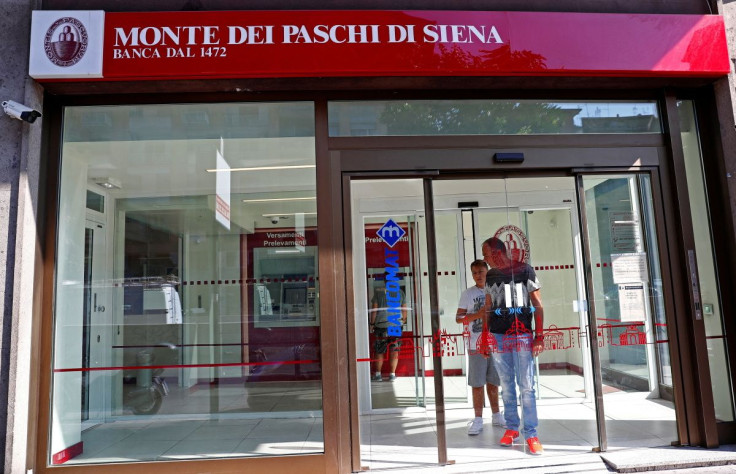People are seen inside a Monte dei Paschi di Siena bank in Rome, Italy August 16, 2018.