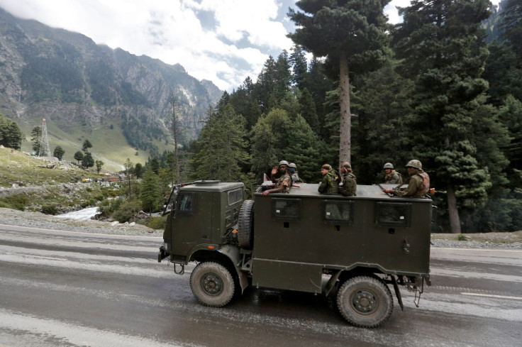 Indian army soldiers are seen atop a vehicle on a highway leading to Ladakh, at Gagangeer in Kashmir's Ganderbal district September 2, 2020. 