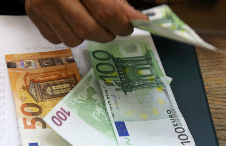 An employee counts Euro bills at a money exchange office in central Cairo, Egypt, March 20, 2019.
