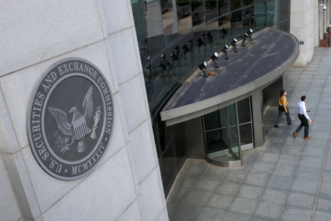 People exit the headquarters of the U.S. Securities and Exchange Commission (SEC) in Washington, D.C., U.S., May 12, 2021. Picture taken May 12, 2021. 
