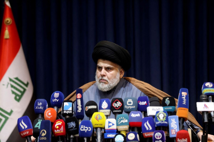 Iraqi Shi'ite cleric Moqtada al-Sadr attends a news conference in Najaf, Iraq, November 18, 2021