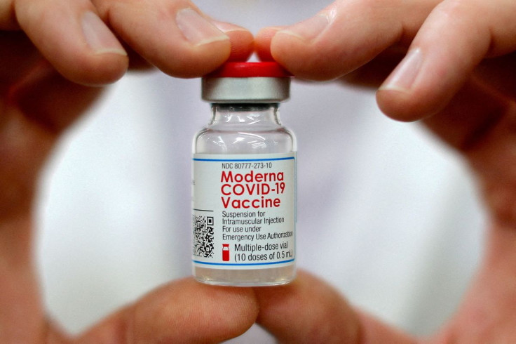 A pharmacist holds a vial of the Moderna coronavirus disease (COVID-19) vaccine in West Haven, Connecticut, U.S., February 17, 2021.