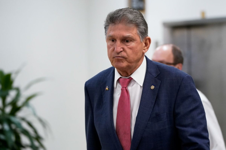 U.S. Senator Joe Manchin (D-WV) walks through the Senate Subway during a vote at the U.S. Capitol in Washington, U.S., April 26, 2022. 