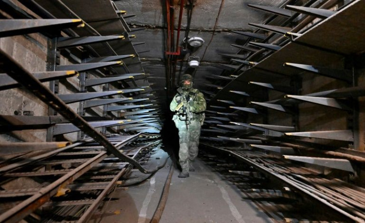 Now Russian soldiers and their separatist allies with white armbands patrol the ruins of the Soviet-era factory that was once the pride of Mariupol and employed more than 12,000 people