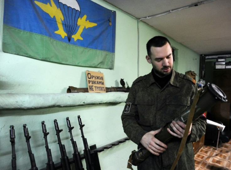 A member of the Russian Imperial Movement holds a weapon simulator at a training base in Saint Petersburg in 2015