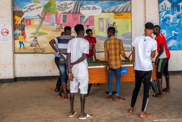 Asylum seekers rescued from Libyan prisons and sent to Rwanda for processing, play at the Emergency Transit Mechanism (ETM) Gashora transit centre, in Bugesera, eastern Rwanda June 10, 2022. Picture taken June 10, 2022. 