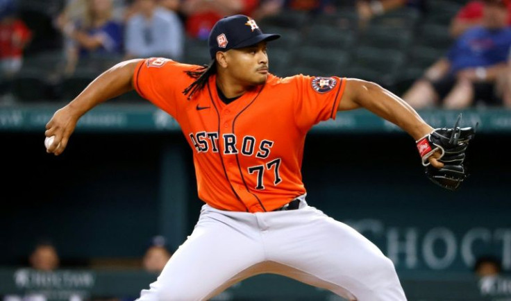 Luis Garcia of the Houston Astros pitches against the Texas Rangers in a game that featured a rare immaculate second inning from Garcia and another immaculate inning by Astros reliever Phil Maton