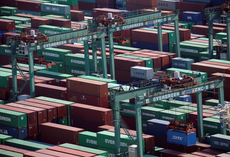 Shipping containers are seen at a port in Tokyo, Japan, March 22, 2017.  