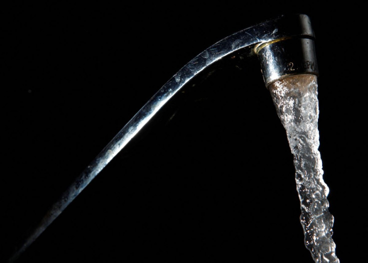 Tap water comes out of a faucet in New York, June 14, 2009.  