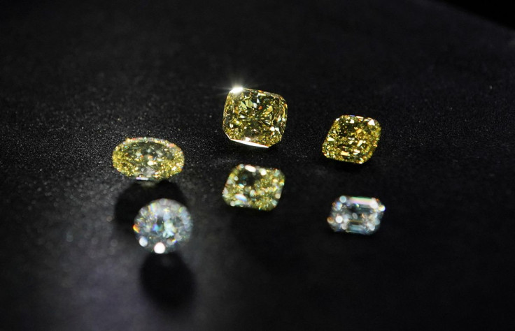A view shows polished colorless and yellow diamonds produced at "Diamonds of ALROSA" factory in Moscow, Russia April 30, 2021. Picture taken April 30, 2021. 