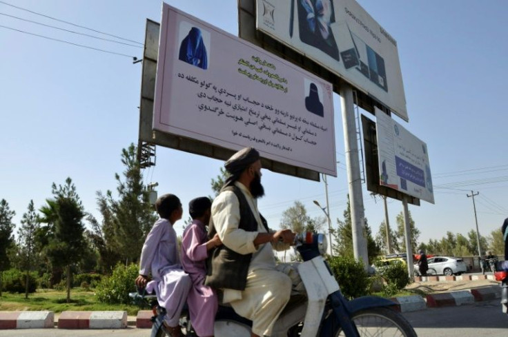 The posters appeared at many cafes and shops, and were also placed on advertising hoardings across Kandahar