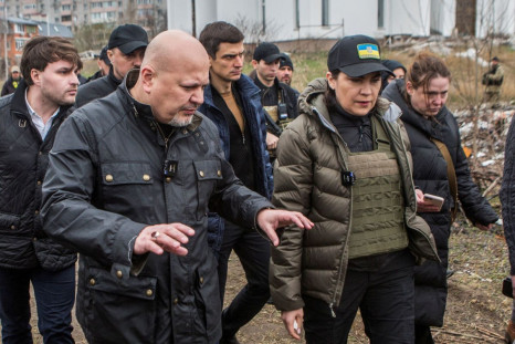 International Criminal Court (ICC) Chief Prosecutor Karim Khan and Ukrainian Prosecutor General Iryna Venediktova visit a site of a mass grave in the town of Bucha, outside Kyiv, Ukraine April 13, 2022. 