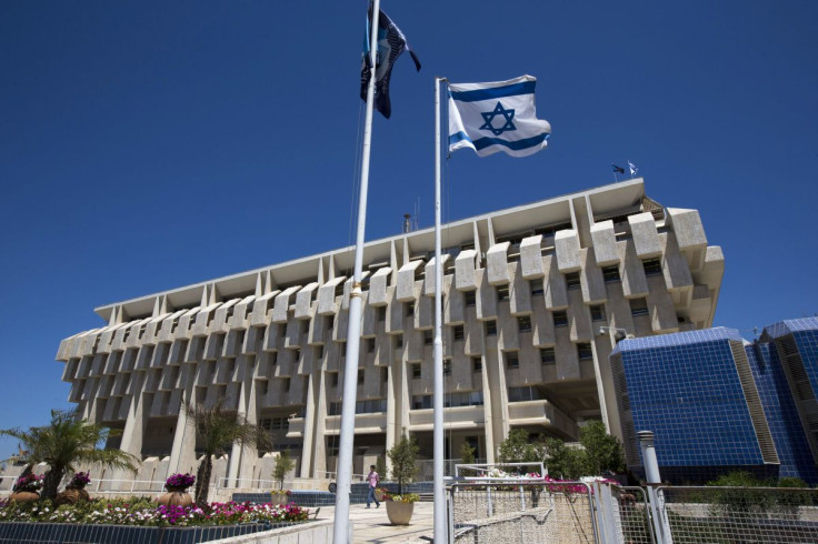 An Israeli flag flutters outside the Bank of Israel building in Jerusalem August 7, 2013. 